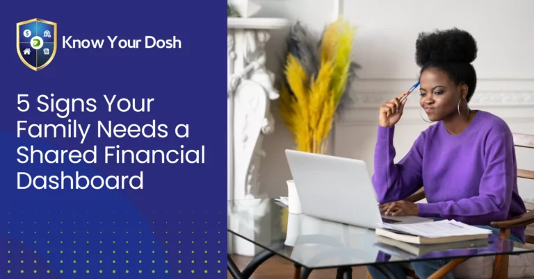 woman sat thinking in front of laptop on desk