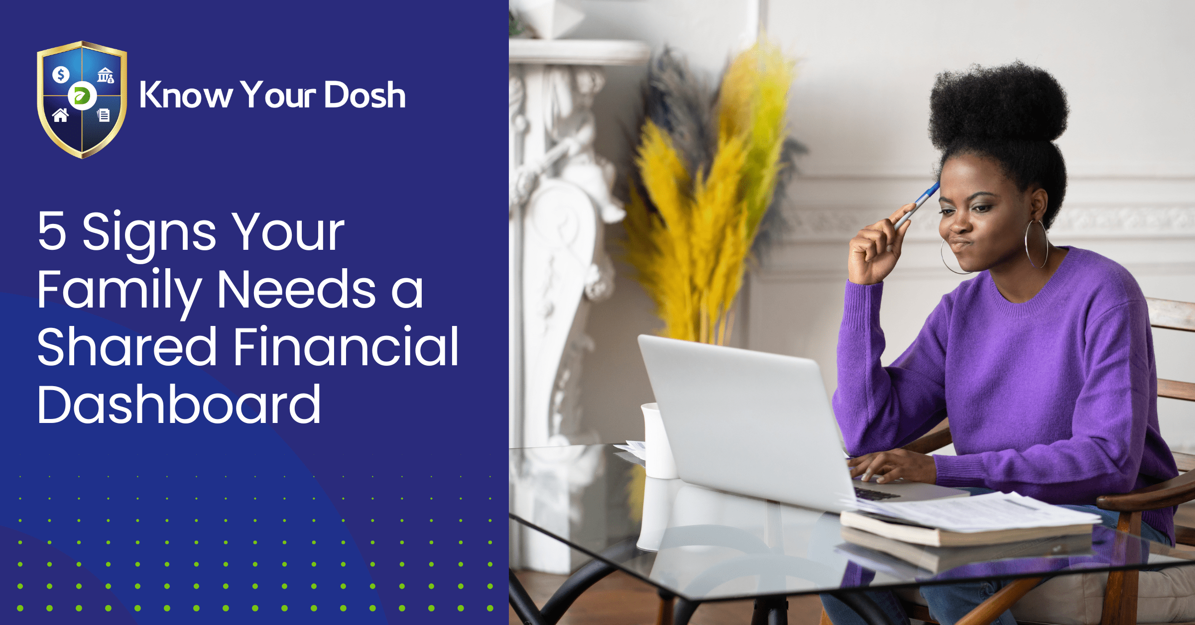 woman sat thinking in front of laptop on desk