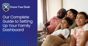 happy family sat together on sofa watching the television