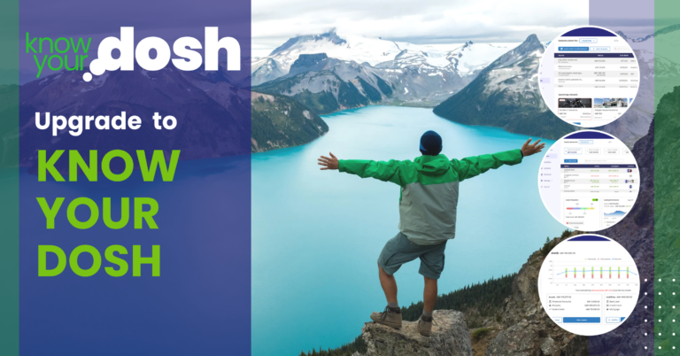 man looking out over lake with arms spread wide