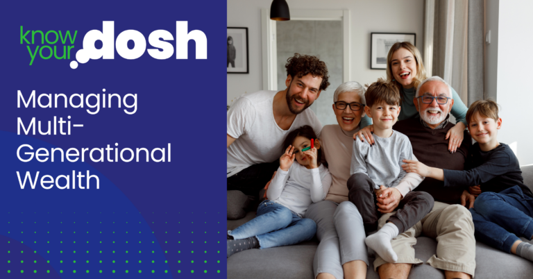 a happy family of three generations sitting on sofa together