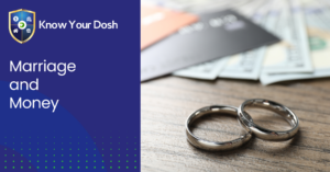 wedding rings on a table alongside bank cards and bank notes to symbolise marriage and money