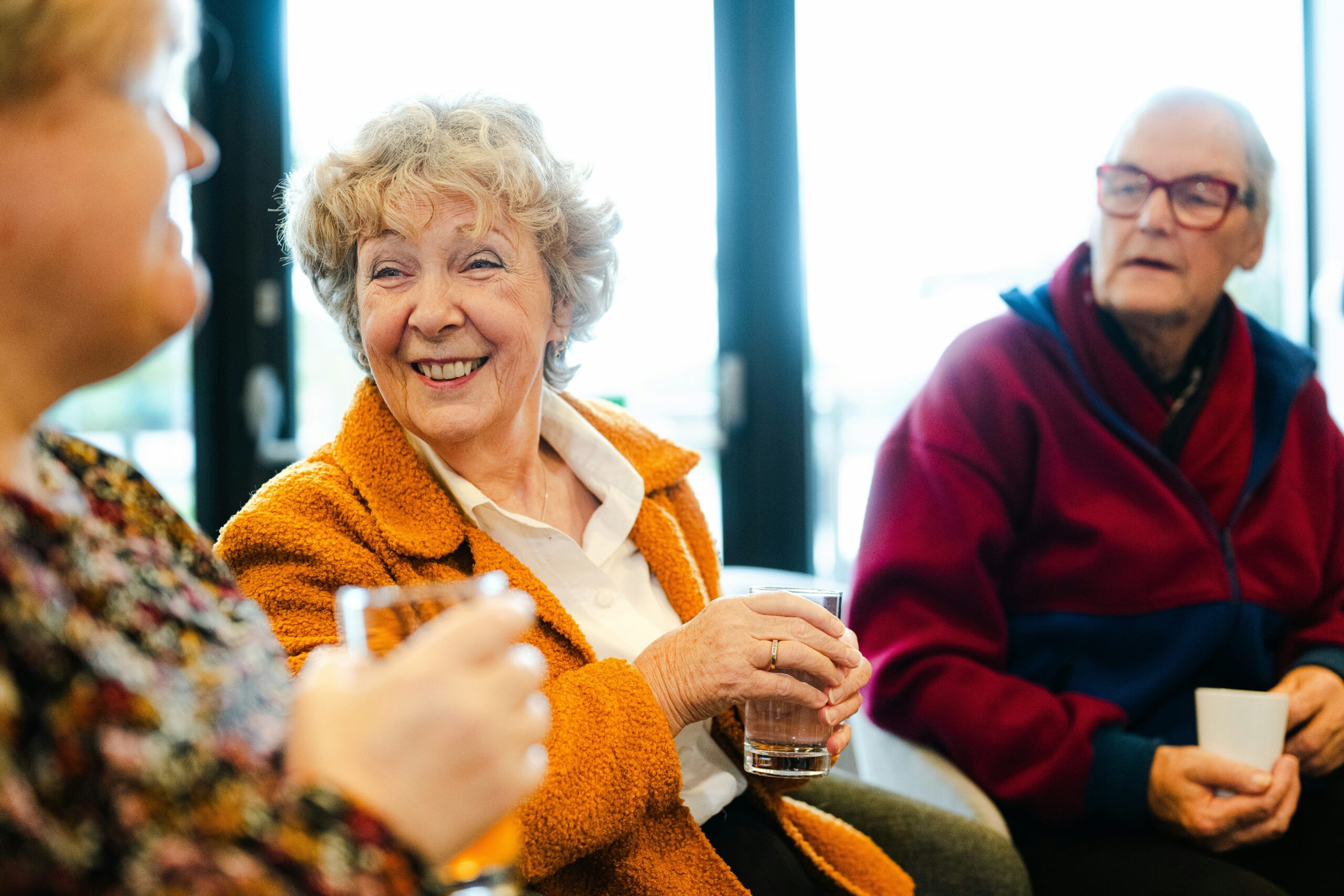 older ladies chatting and having tea