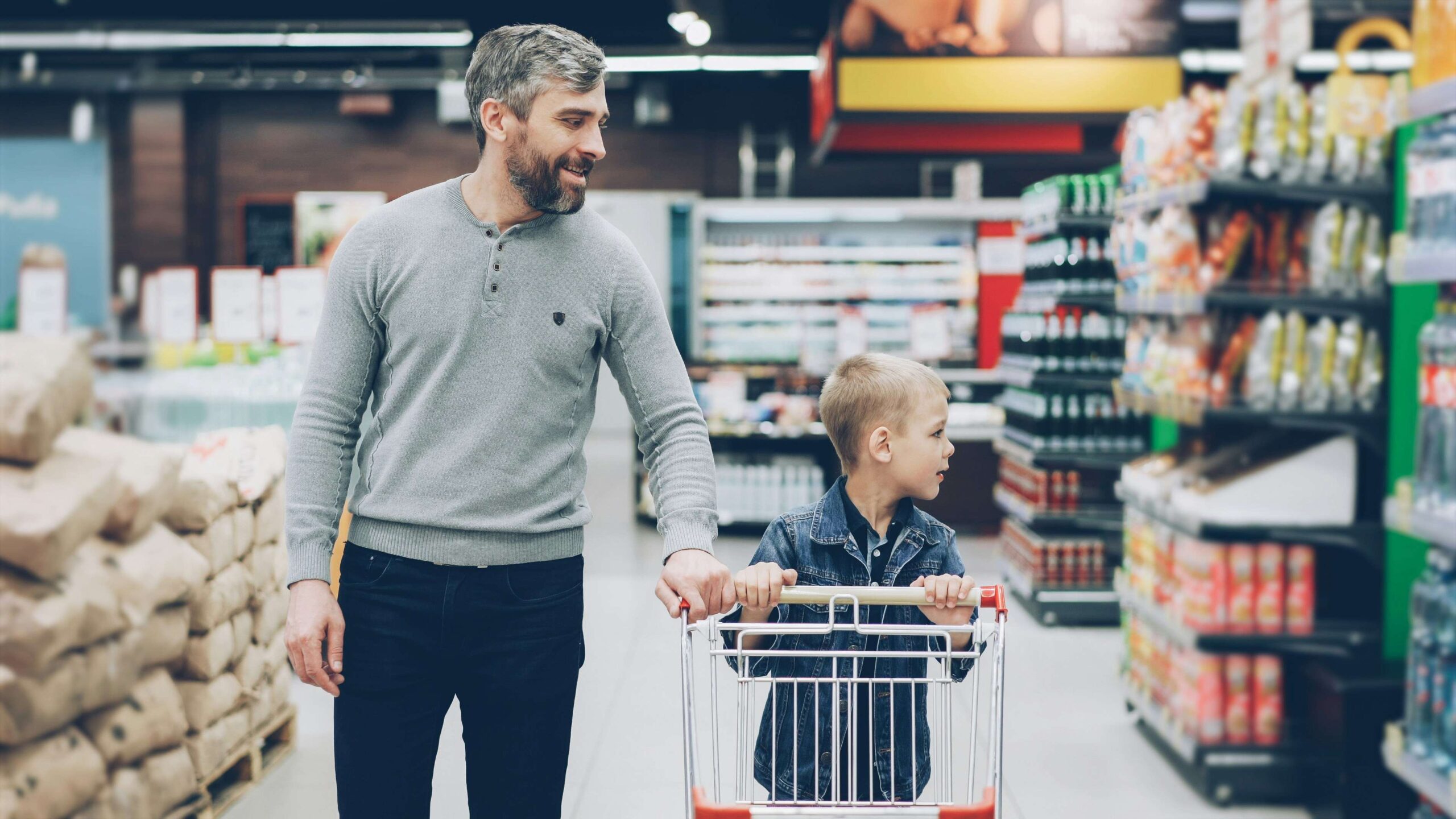 father and son at the supermarket